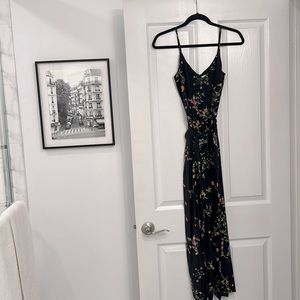 Lovely black wide leg silk jumpsuit with delicate floral print by L’Agence!